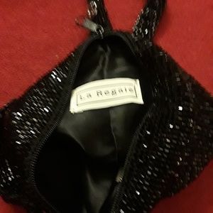 La Regaie sequined purse